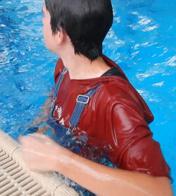 jeans and hoodie in swimming pool